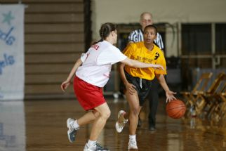 Special Olympics Running dribble.JPG